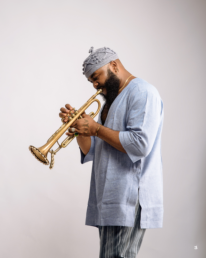 Etuk Ubong + The Etuk Philosophy Logo